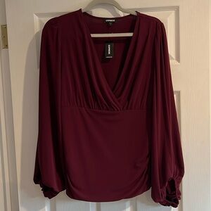 Express plum colored blouse size large NWT
